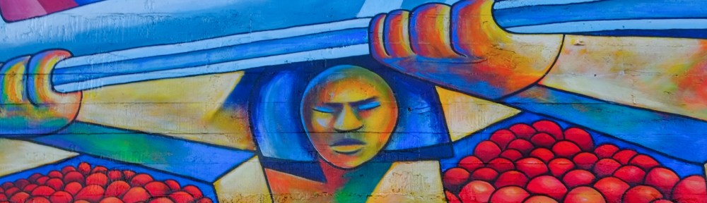 mural, man with eyes closed is one of many men holding up train tracks, mission district, San francisco
