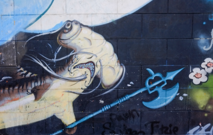 part of a mural by Persue, Dave Persue Ross, sharks vs tiger, hammerhead shark with weapon, blade on a stick, 
