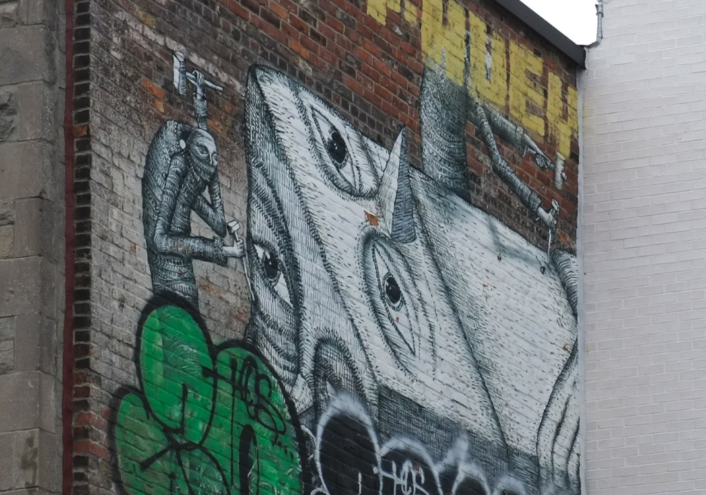 part of a mural by phlegm, black and white